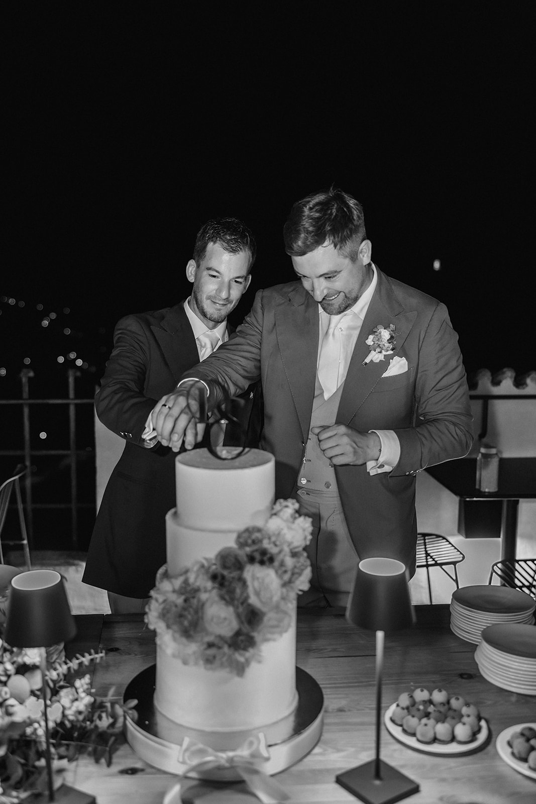 Simon and Dima cutting their wedding cake